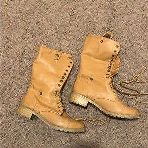 Brown leather boots. Perfect for fall and winter.